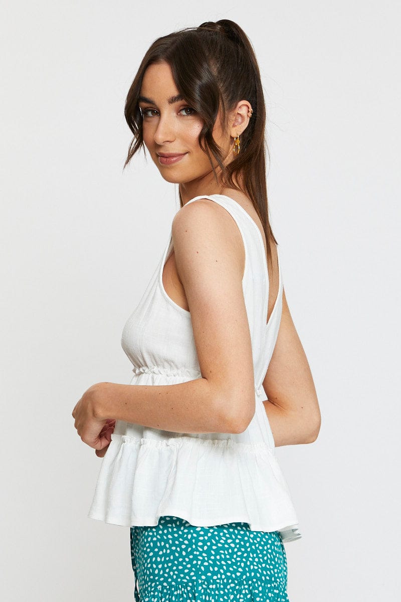 White Peplum Blouse Sleeveless V-Neck - Image 4